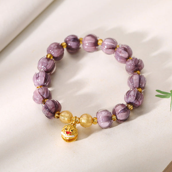 Purple lily of the valley flower lion bell bracelet