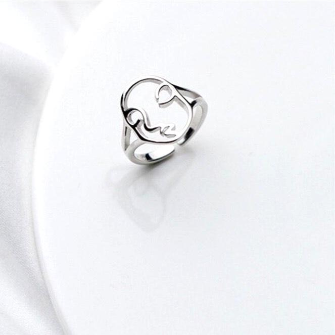 Hollow Abstract Face Ring